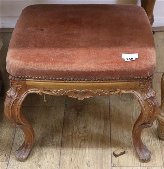 A 19th century walnut stool